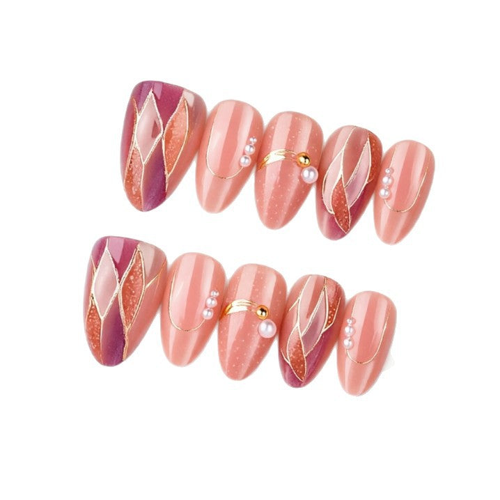 Artificial nails with elegant pearl and gold accents Kalsten