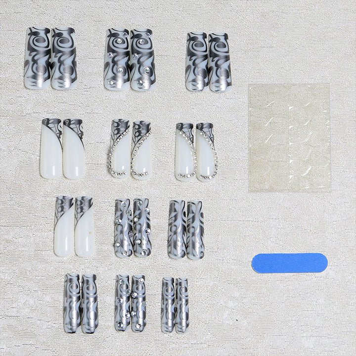 Acrylic nail set with elegant patterns and sparkling accents Kalsten