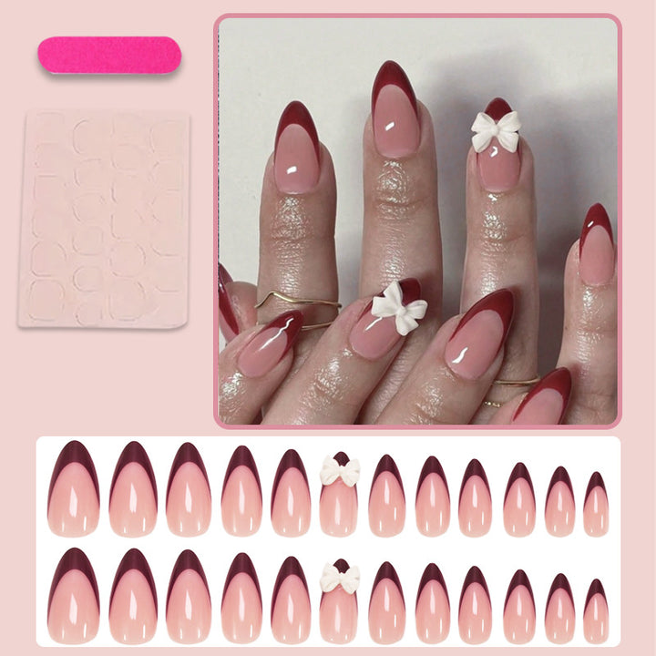 Acrylic nail set with elegant lace design and romantic bows Kalsten