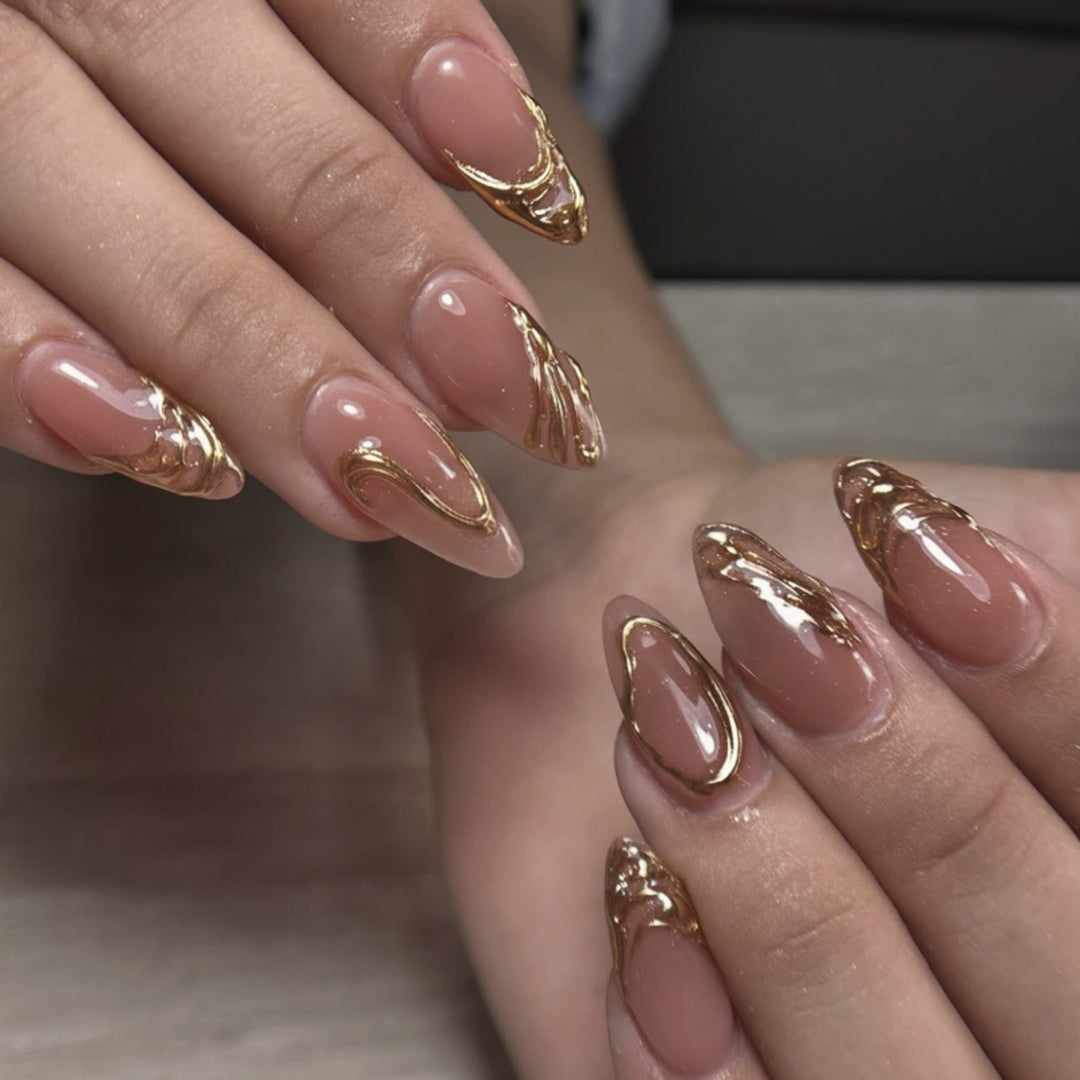 Artistic acrylic nails with gold embellishments Kalsten