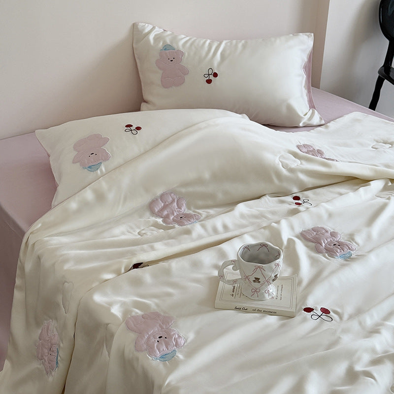 Satin bedding set with playful whale print and silky shiny surface