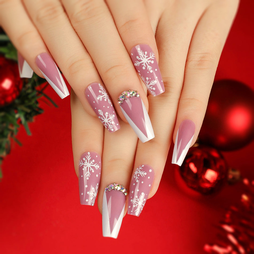 Artistic Nail Extensions with Snowflake Design and Glitter Accents Kalsten