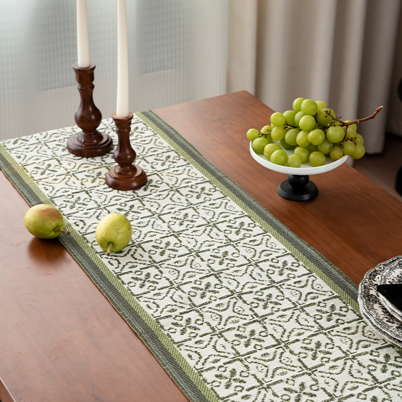 Decorative table runner with woven ornament jacquard and finely hemmed edges Kalsten