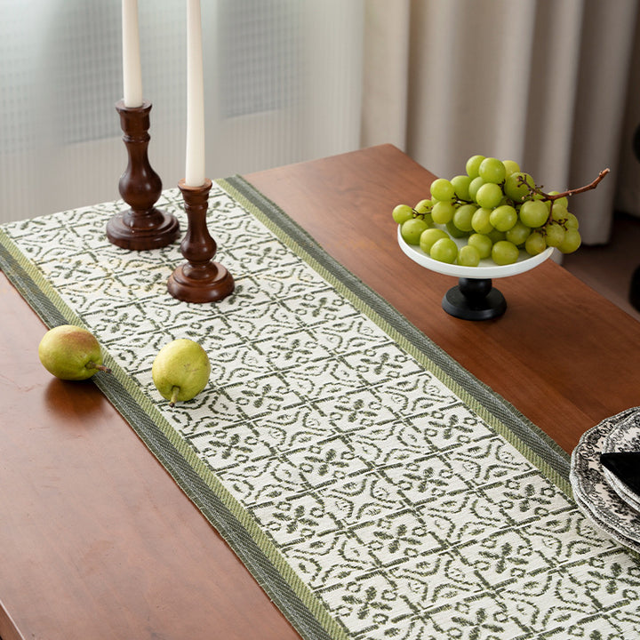 Decorative table runner with woven ornament jacquard and finely hemmed edges Kalsten