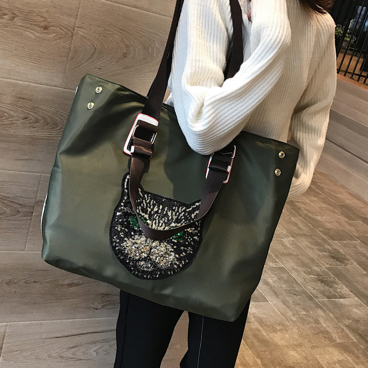 Stylish shoulder bag with unique cat motif Kalsten