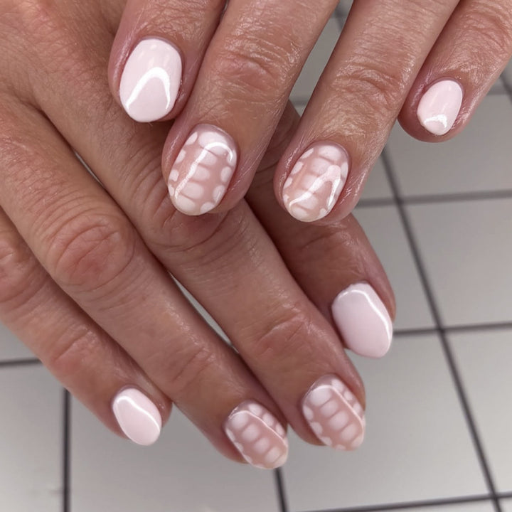Artistic nail art with elegant lines and delicate design Kalsten