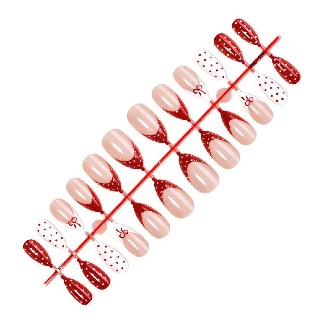 Nail set with elegant bows and polka dots Kalsten