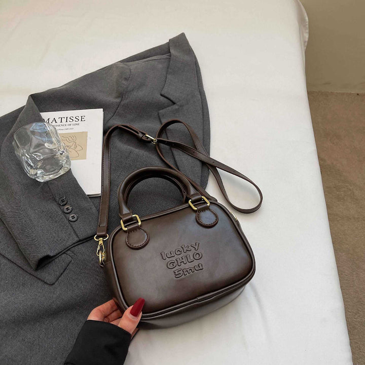 Vintage-Inspired Structured Handbag Kalsten