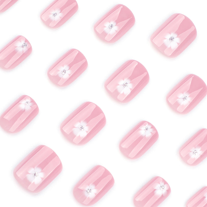 Elegant artificial nails with filigree floral motifs and glitter accents Kalsten
