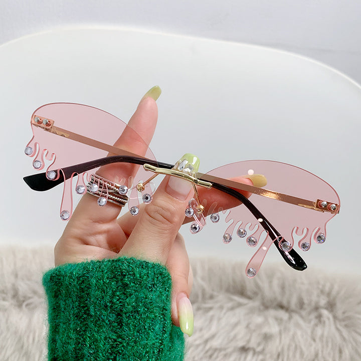 Ladies striking sunglasses in fluid design Kalsten