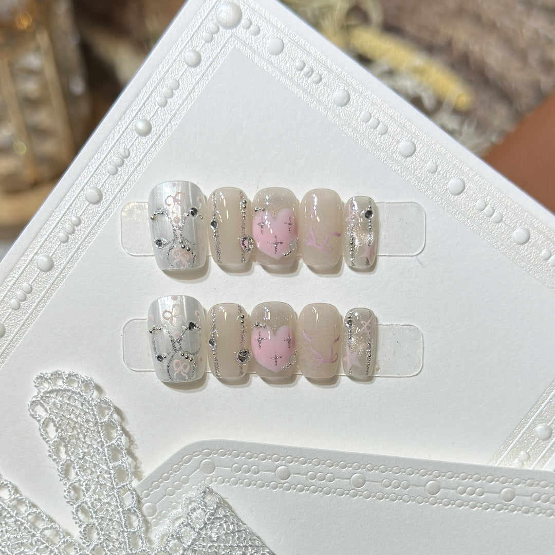 Decorative Press-On Nail Set with Heart and Silver Accents Kalsten