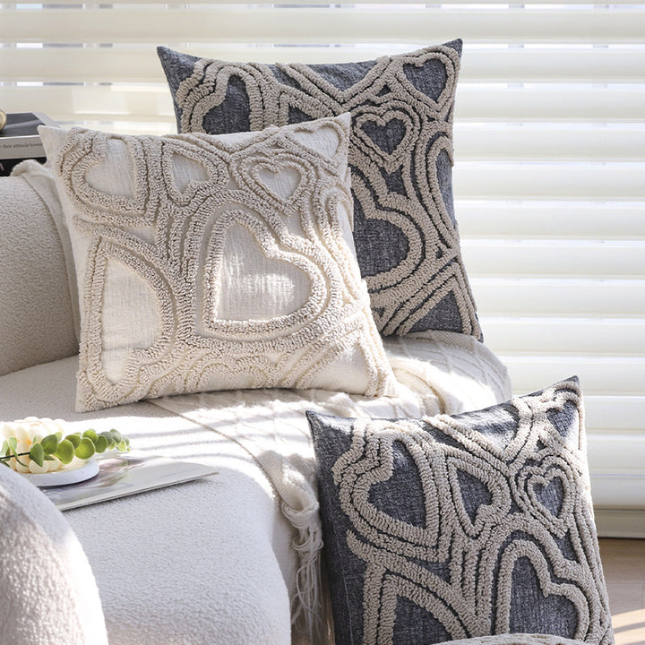 Square cushion cover with three-dimensional looped heart relief made of soft bouclé mix Kalsten