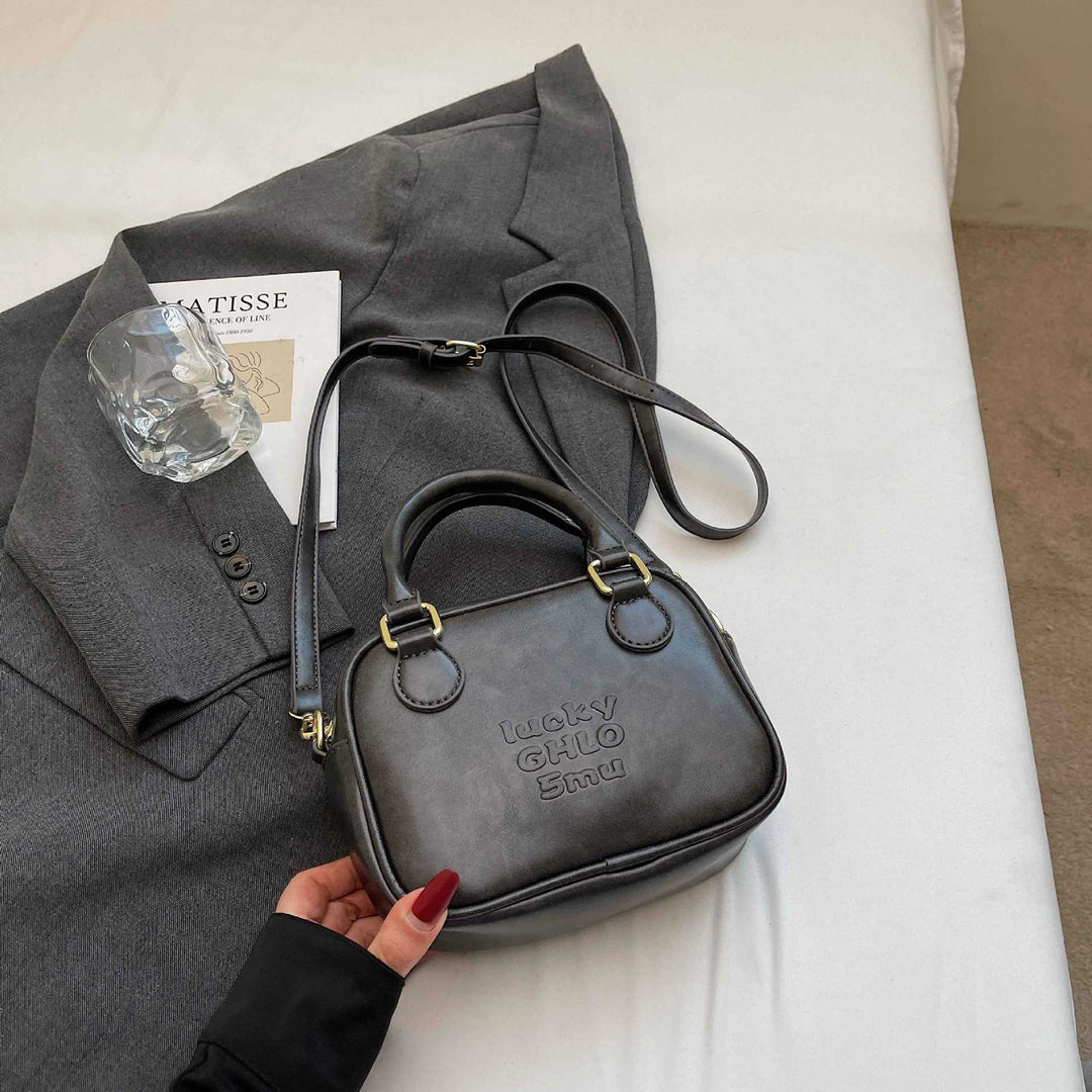 Vintage-Inspired Structured Handbag Kalsten