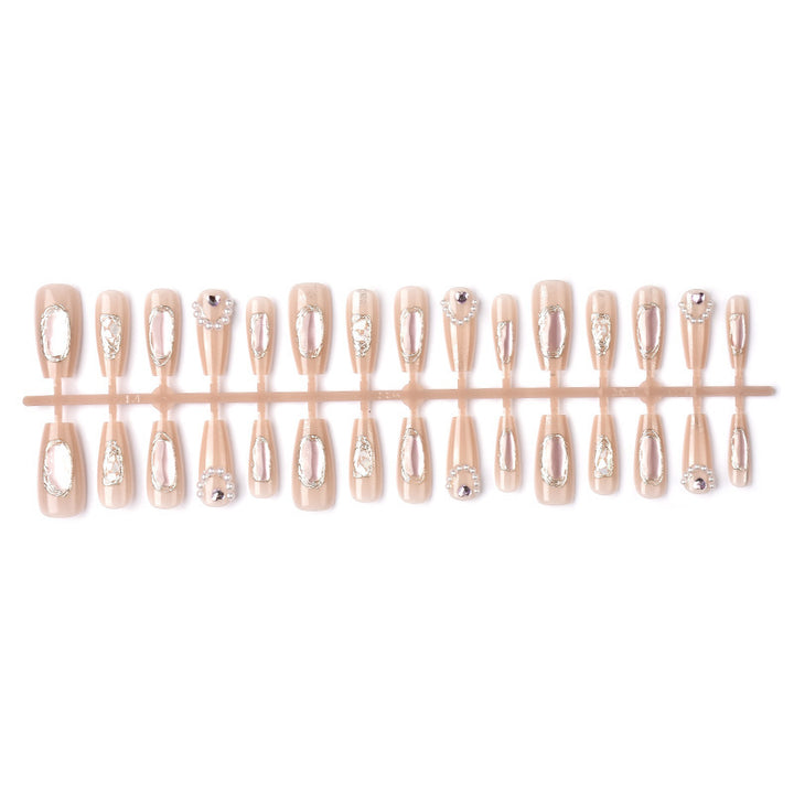 Artistic Press-On Nail Design with Elegant Metallic Accents