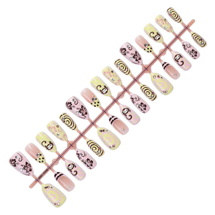 Creative nail art set with playful monkey designs and glitter details Kalsten