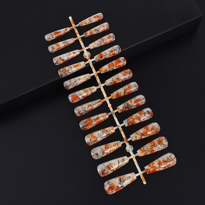 Creative nail art with blood splatter design Kalsten