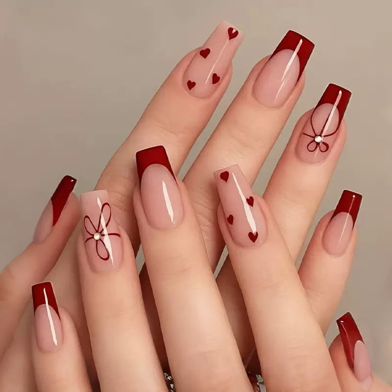 Artificial nail set with romantic heart and bow motifs Kalsten