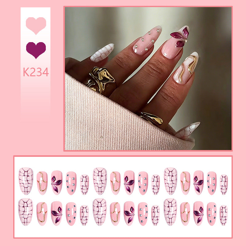 Acrylic nail set with glamorous design and sparkling accents Kalsten