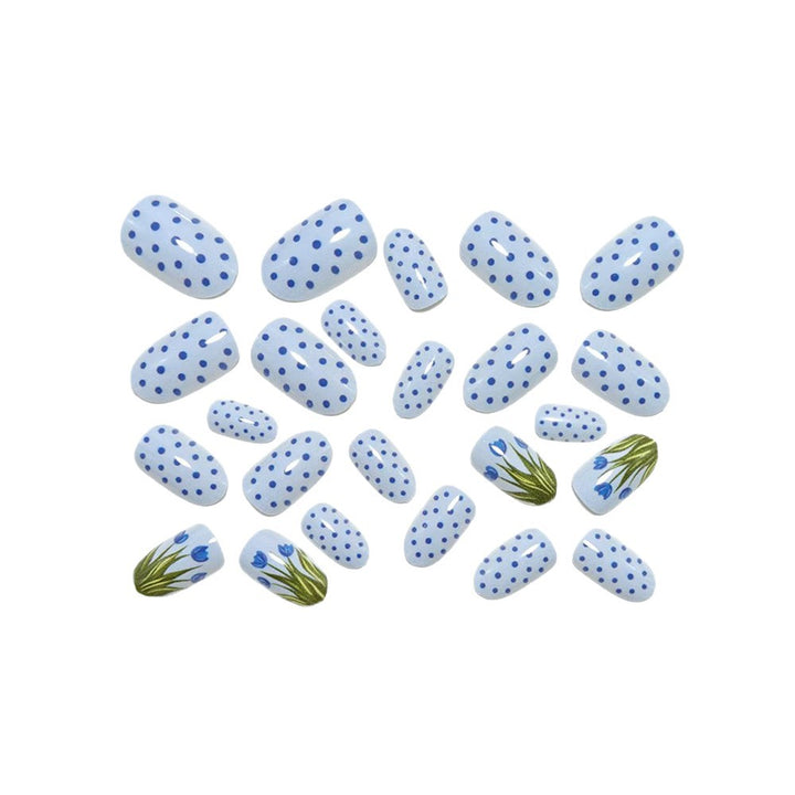 Creative art nails in an elegant polka dot design with floral accents Kalsten