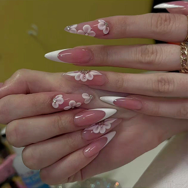 Elegant artificial nail set with floral design and glitter accents Kalsten