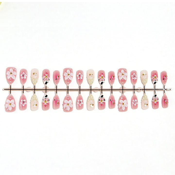 Artificial nail set with elegant floral accents Kalsten