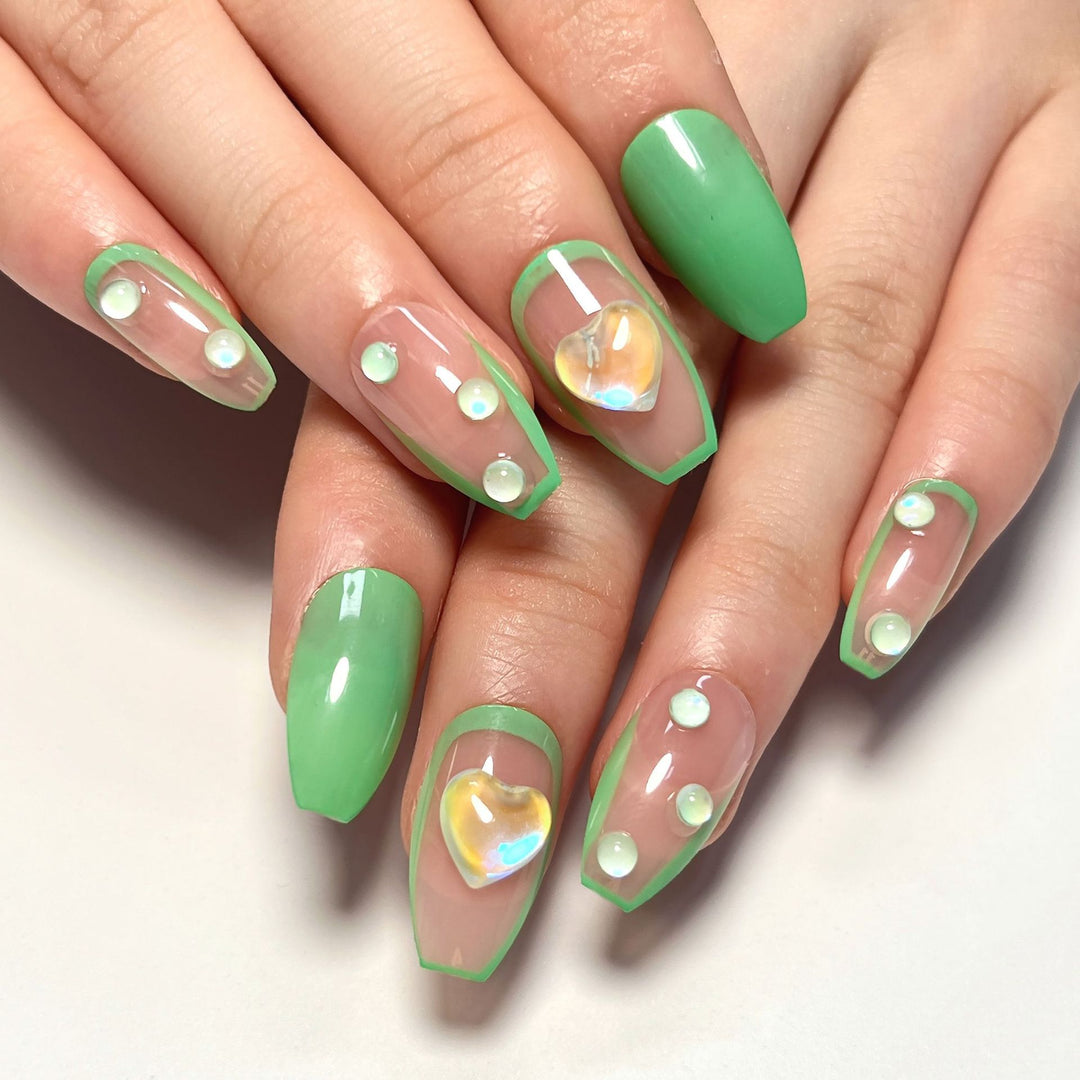 Creative Nail Art with Glitter and Heart Decorations Kalsten