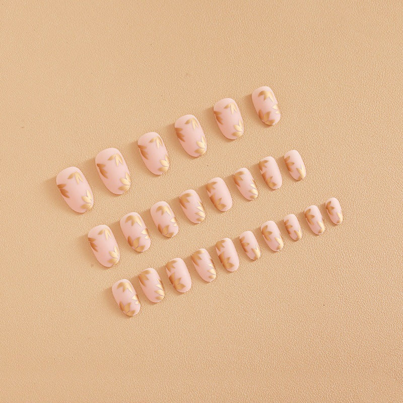 Artificial nail set with elegant gold leaf design Kalsten