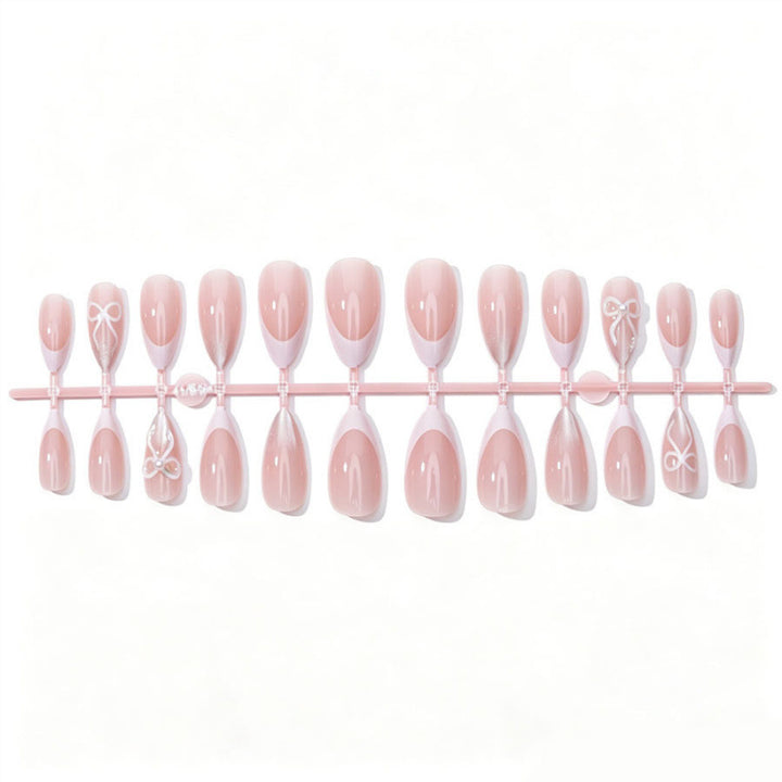 Elegant Press-On Nail Set with Bow and Glitter Accents