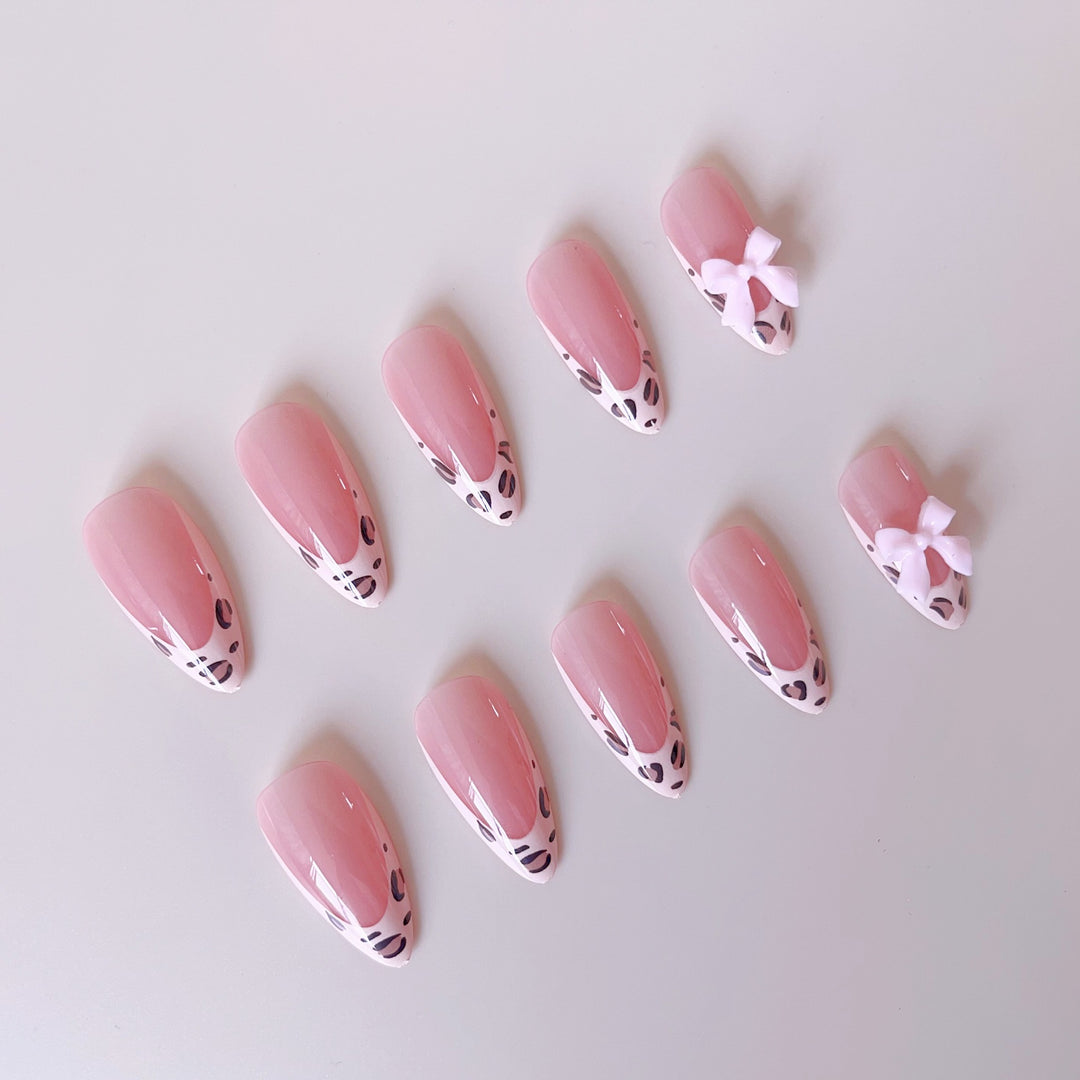 Acrylic nail set with leopard pattern and decorative bows Kalsten