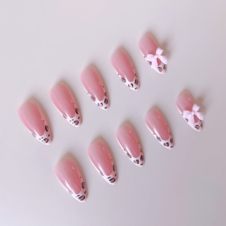 Acrylic nail set with leopard pattern and decorative bows Kalsten