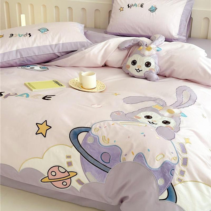 Children's bedding set with playful space bunny design