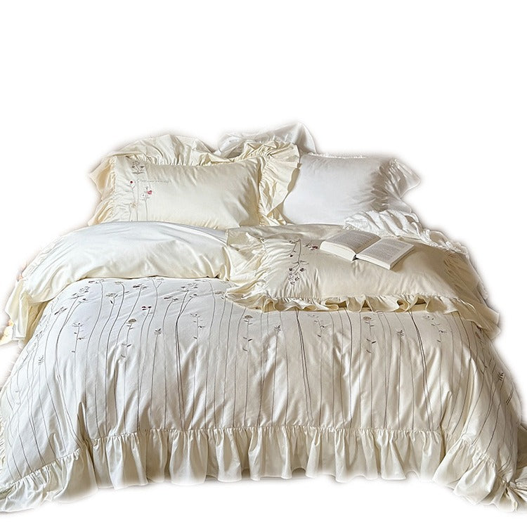 Cotton-linen bed set with embroidered meadow motif & ruffled bed skirt