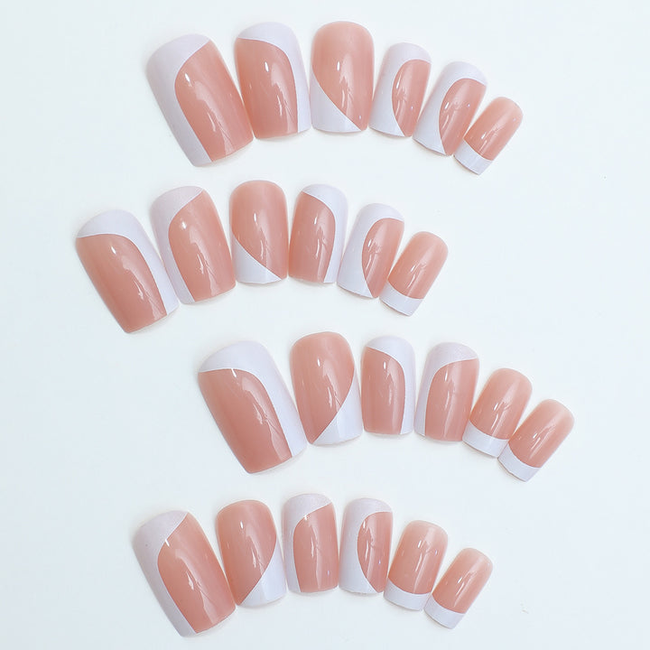 Artificial nail set with elegant French tip design and modern accents Kalsten