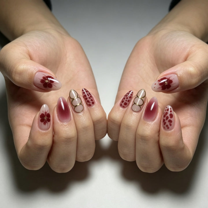 Artificial nails with elaborate flower designs and elegant accents Kalsten