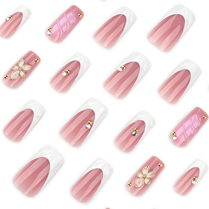 Glamorous gel nails with floral accent and glitter details Kalsten