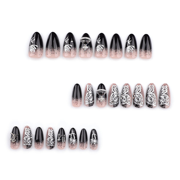 Artful stiletto nails with delicate embellishments and glamour accents Kalsten