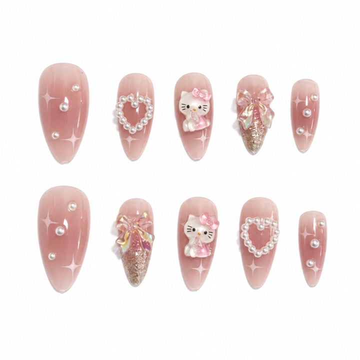 Playful artificial nails with heart and kitty motifs Kalsten