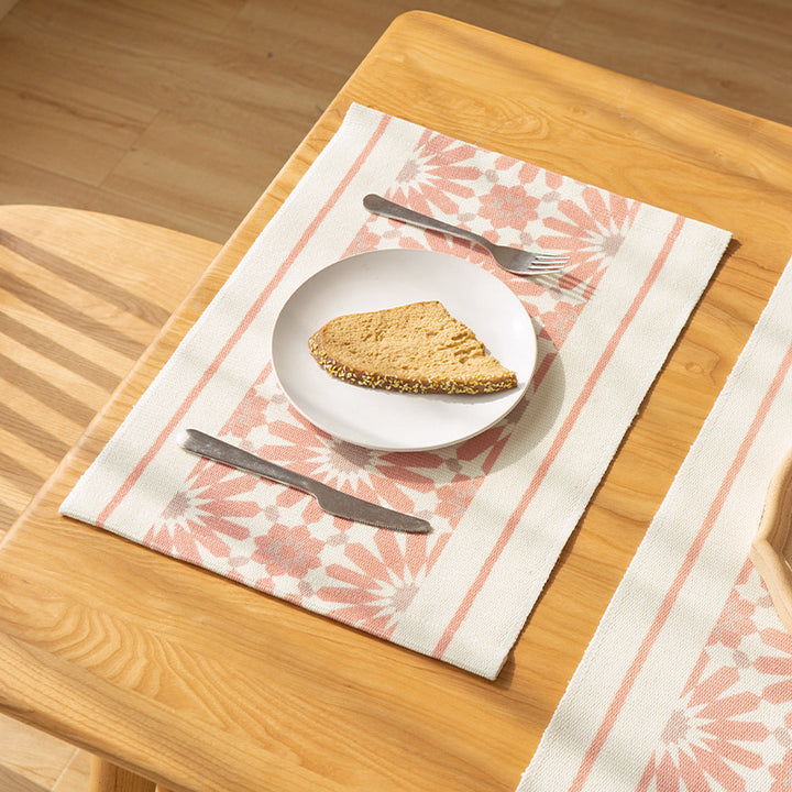 Woven rectangular table set made of cotton blend with central diamond band