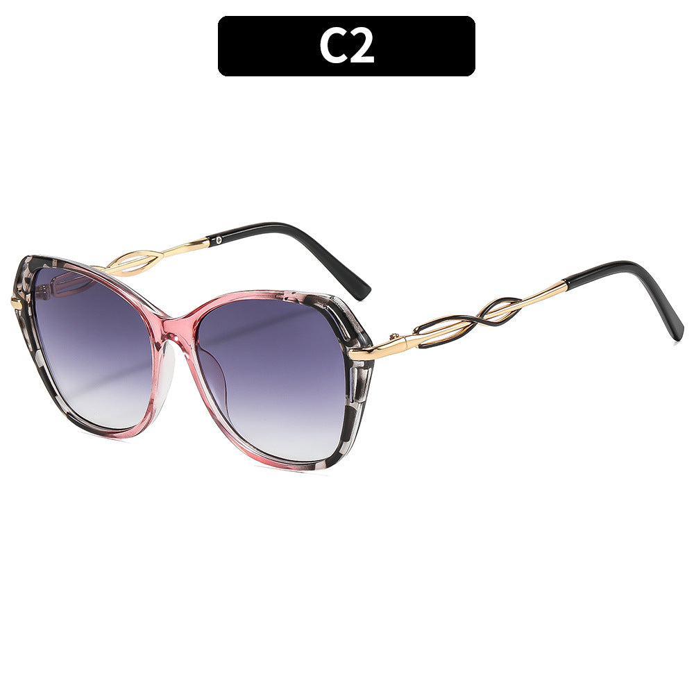 Stylish Cat-Eye Sunglasses with Elegant Gold Accents