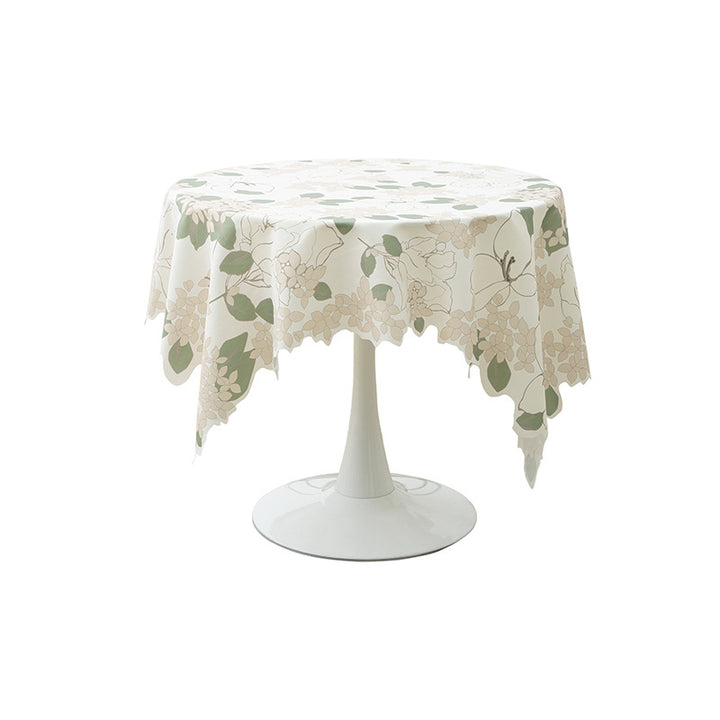 Round wipeable tablecloth with floral cut-out hem Kalsten