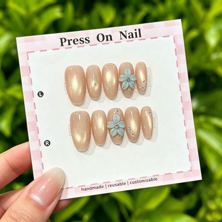 Artistic Press-On Nail Art Set with Cute Character and Bow Accents