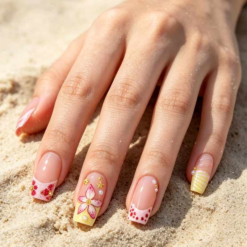Nail art set with floral accents and glitter decorations Kalsten