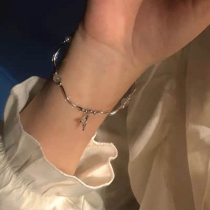 Elegant Silver Fish Charm Bracelet Kalsten