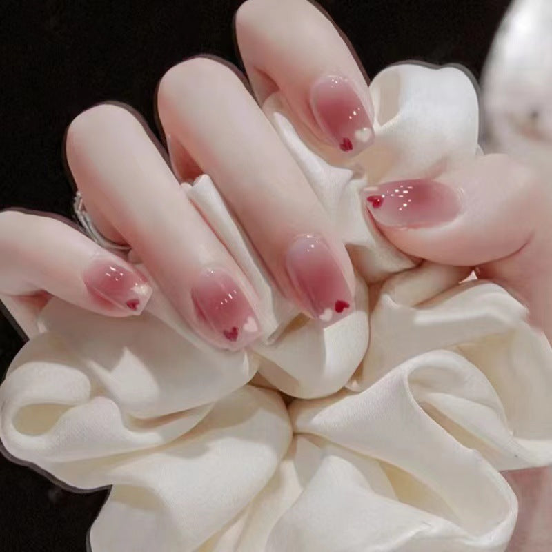 Glamorous artificial nails with delicate flower and glitter effects Kalsten