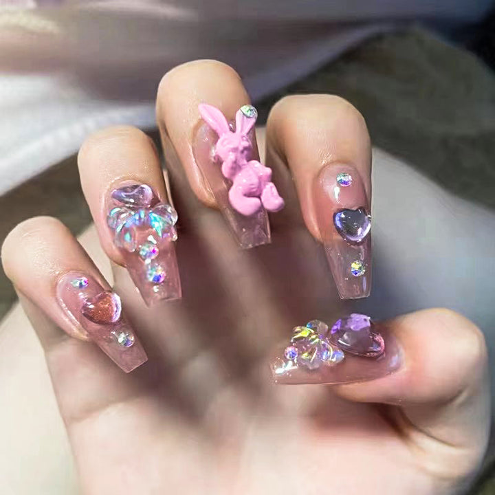 Artificial nail extensions with artistic decorations Kalsten
