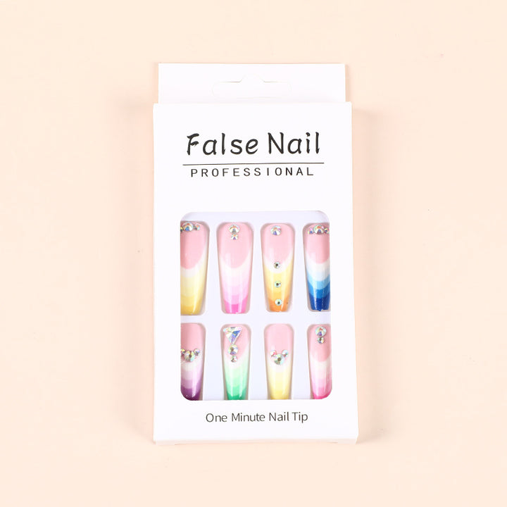 Artificial nails in luxurious ombre design with rhinestone accents Kalsten