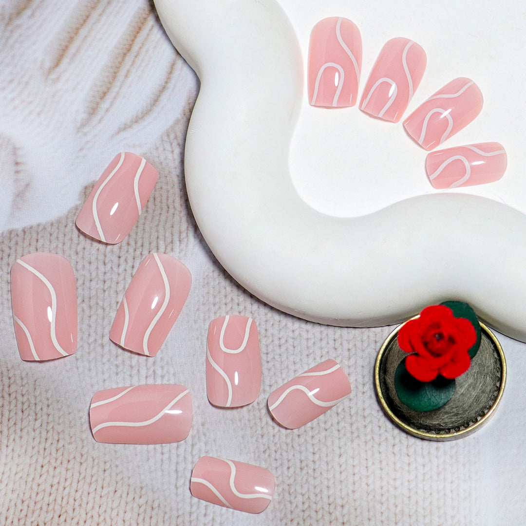 Elegant Press-On Nail Design with Artistic White Swirl Kalsten