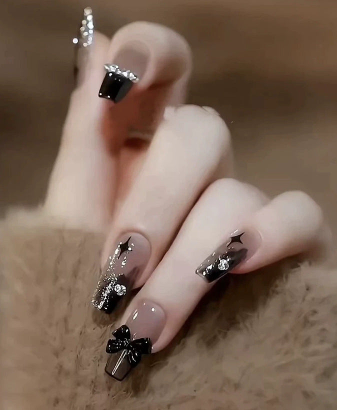 Elegant nail design with pearl embellishment Kalsten