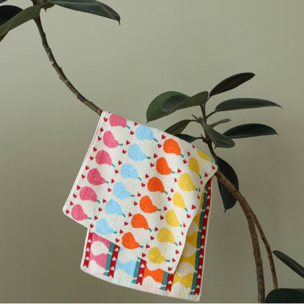 Jacquard guest towel made of cotton terry with playful bird and heart pattern