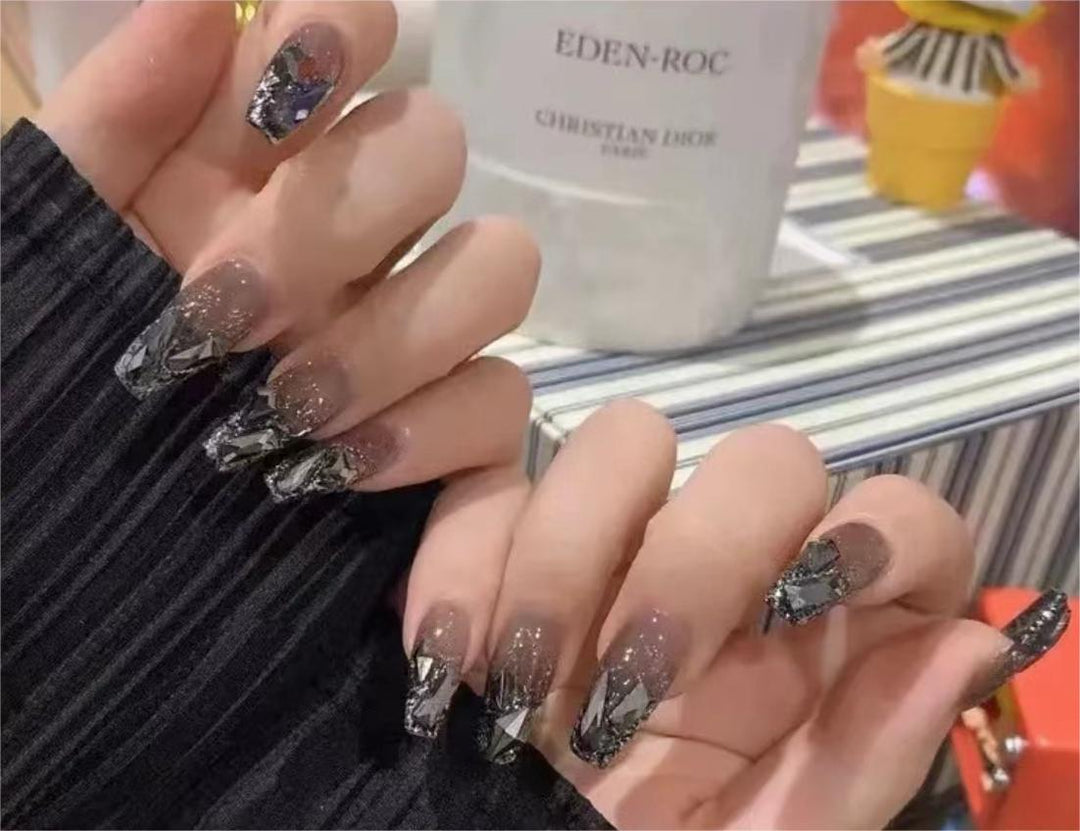 Elegant Nail Art with Glitter and Rhinestones Kalsten